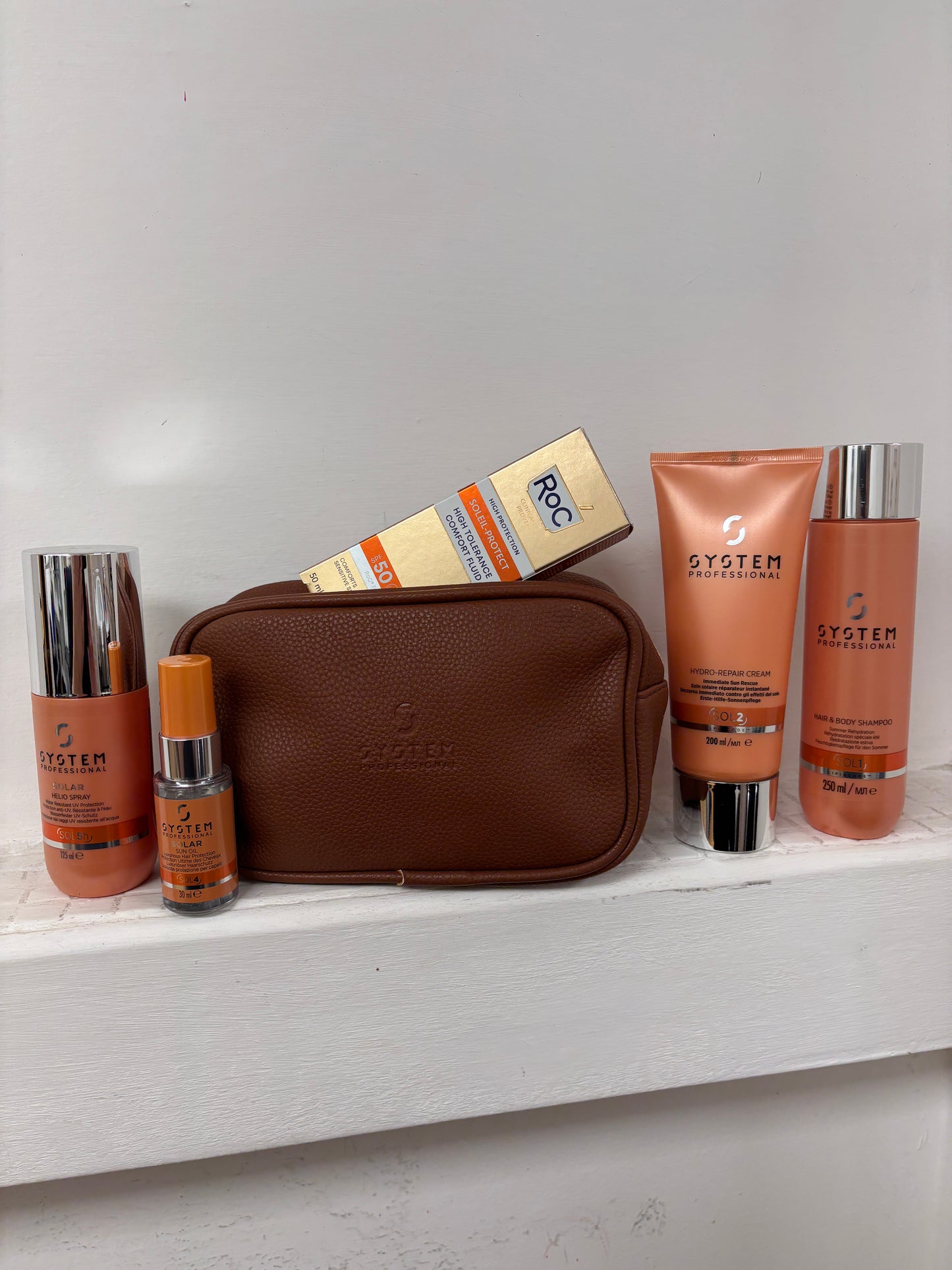 Solari Wella kit 5 prodotti: shampoo- conditioner - olio in spray-mini olio da viaggio-crema protettiva ROC